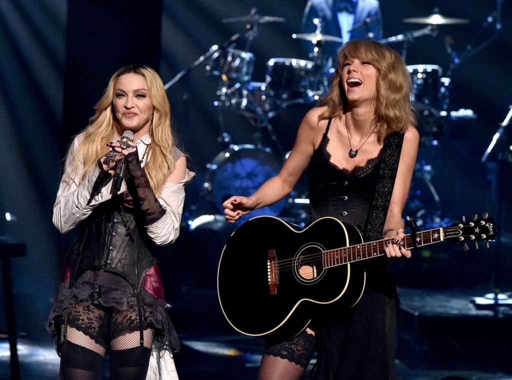 Madonna y actúa con 10 o más números 1 en Billboard 200 y Hot 100